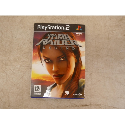 5060 - A satin silver Playstation 2 - boxed with power supply, av cables, 2 controllers and a quantity of P... 