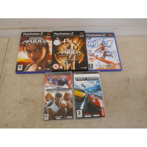 5060 - A satin silver Playstation 2 - boxed with power supply, av cables, 2 controllers and a quantity of P... 