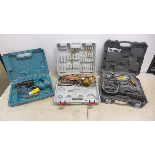 5041A - Two cased power tools including a Titan TTB278505 230v SDS plus rotary hammer drill, a Makita 6834 2... 