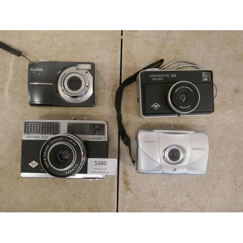 5080 - A quantity of cameras including a Kodak Easy Share C913, an Agfa AGFAMATIC 100, a Kodak Advantix T60... 