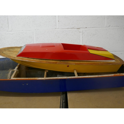 5093 - Three model boats including a model contrabande boat with display stand