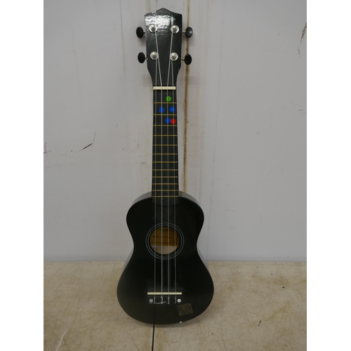 5096 - A quantity of musical instruments, including a violin in a case, an Ashton UKE100 Ukulele in a case,... 