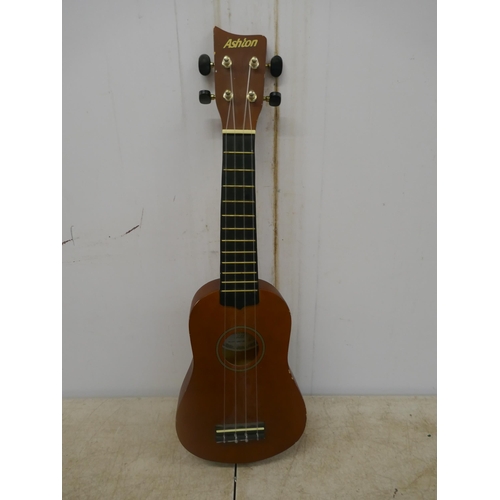 5096 - A quantity of musical instruments, including a violin in a case, an Ashton UKE100 Ukulele in a case,... 