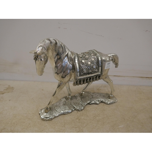 5097 - A silver coloured cheetah ornament and a silver coloured horse ornament