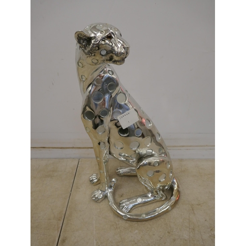 5097 - A silver coloured cheetah ornament and a silver coloured horse ornament