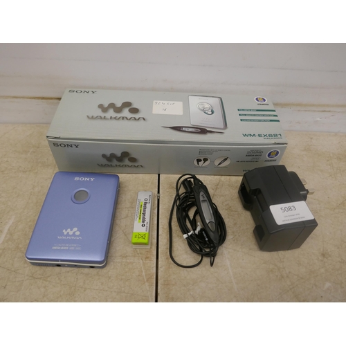 5083 - A Sony WK-EX621 Walkman cassette player with rechargeable battery, battery charger and headphones wi... 