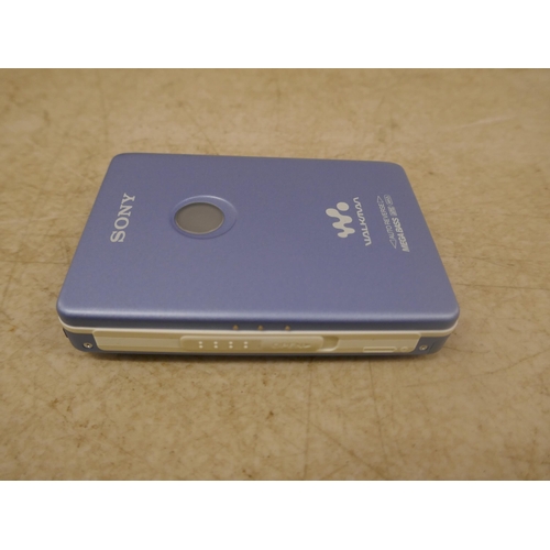 5083 - A Sony WK-EX621 Walkman cassette player with rechargeable battery, battery charger and headphones wi... 