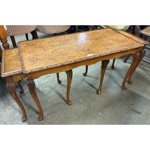 228 - A Queen Anne style burr walnut nest of tables