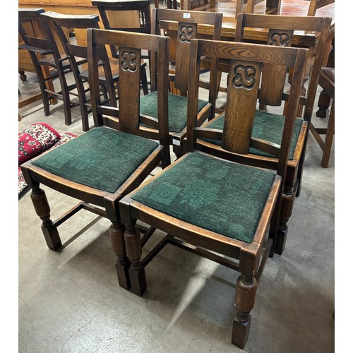 247 - A set of four early 20th Century oak dining chairs