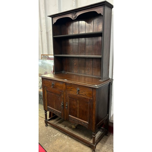 253 - An early 20th century carved oak dresser