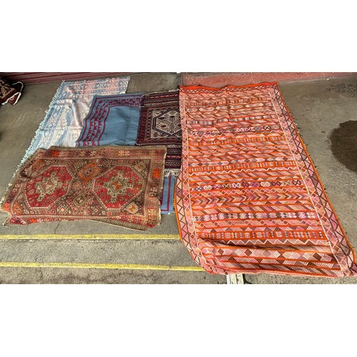 254 - Five assorted rugs