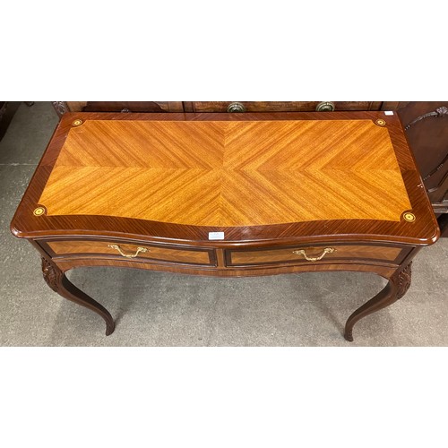 118 - A French Louis XV style inlaid mahogany two drawer serpentine console table