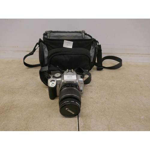 5073 - A Canon DS126151 digital camera and carry bag