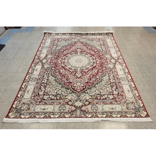 270 - A Kashan Shahkar Dorrin pattern red ground rug, 356 x 252cms