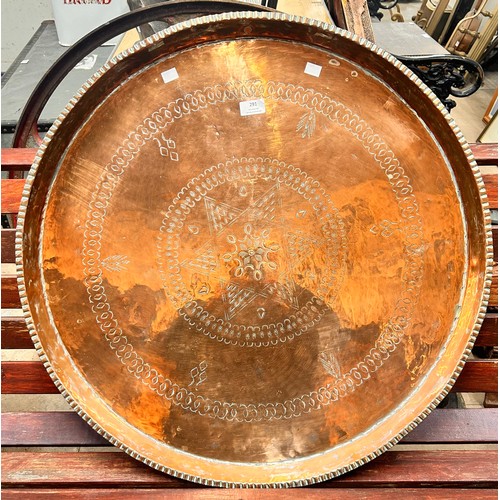 291 - A large Eastern wall hanging copper charger