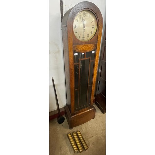 123 - An Art Deco Enfield oak triple weight longcase clock