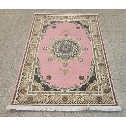 267 - A Kashan Shahkar Dorrin pattern salmon ground rug, 228 x 151cms