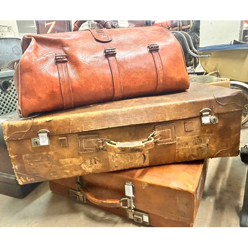 304 - Two leather suitcases and a Gladstone bag