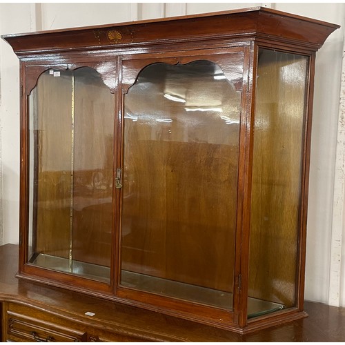 140 - An Edward VII walnut shop display cabinet