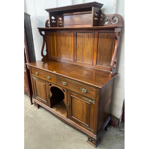 143 - A Arts & Crafts walnut Maple & Co. sideboard