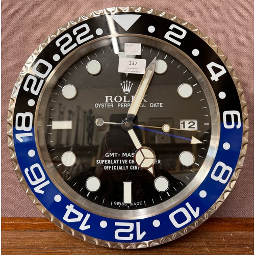 337 - A Rolex dealers display wall clock