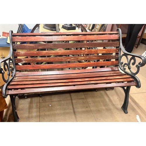 306 - A cast iron ended garden bench