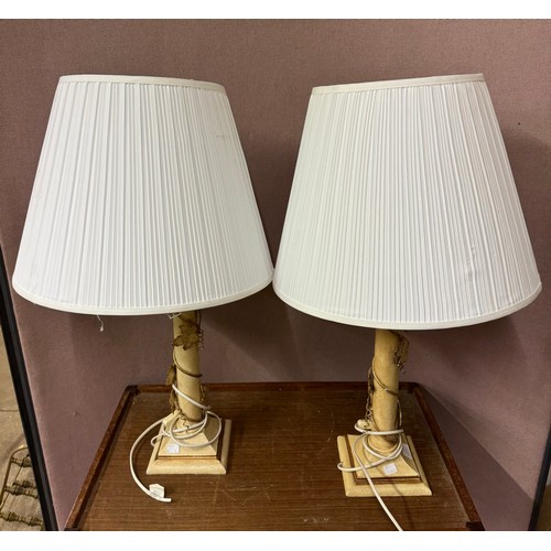 314 - A pair of gilt table lamps