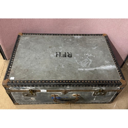 316 - An early 20th Century steamer trunk, containing a collection of architectural drawings