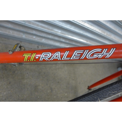 5135 - A T.I Raleigh Europa racing bike with a locked bike chain (No key) and one other bike chain