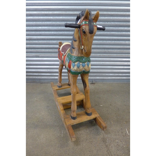 5147 - A vintage wooden rocking horse