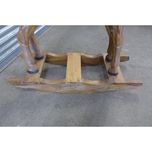 5147 - A vintage wooden rocking horse