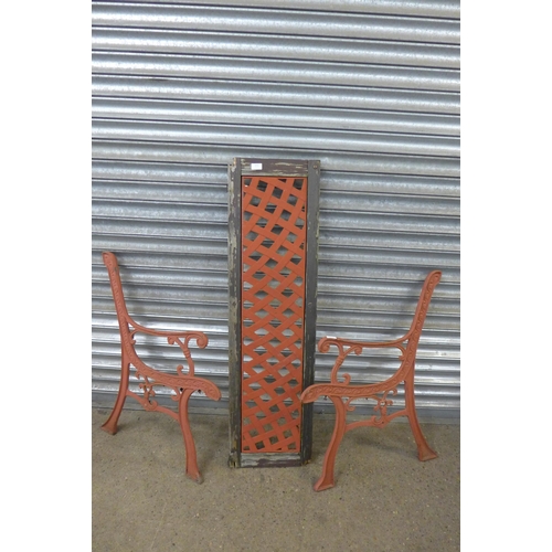 5151 - A pair of cast iron bench ends and bench back