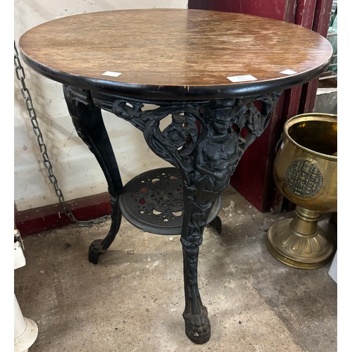 277 - A cast iron based pub table