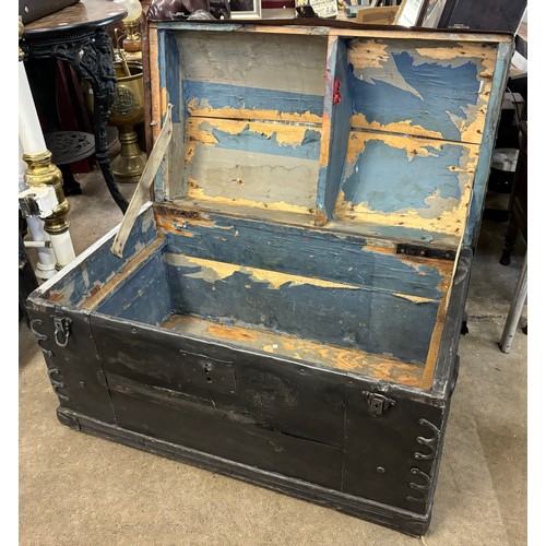 275 - A Victorian metal bound domed top steamer trunk