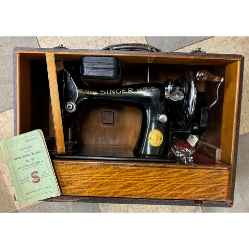 278 - A cased Singer sewing machine