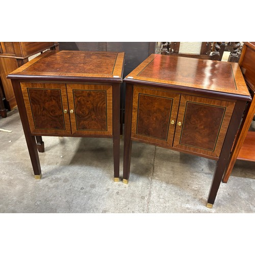 157A - A pair of French style inlaid burr walnut night stands