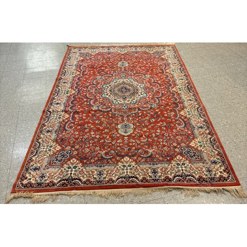 233A - An eastern red ground rug