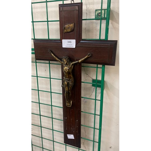 346 - An early 20th Century brass and oak crucifix