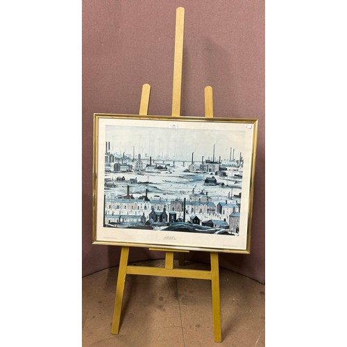 396 - An L.S. Lowry print on an artists easel