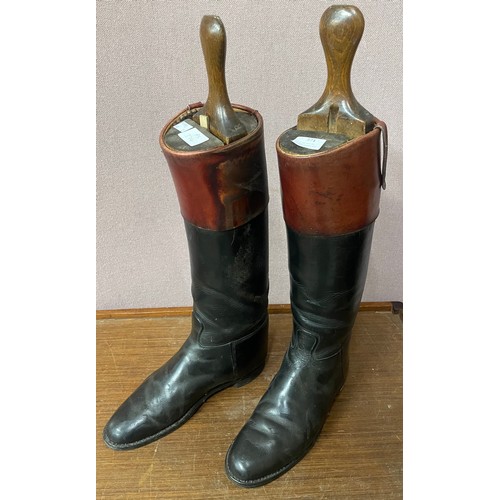 371 - A pair of vintage leather riding boots with treen boot trees