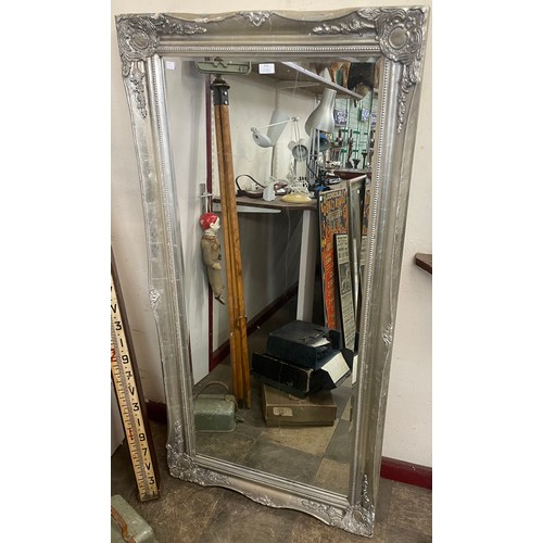 374 - A large French style silver effect mirror