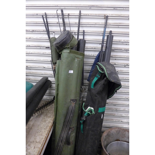 5159 - A large quantity of fishing equipment including rods, tackle box, reels, etc.