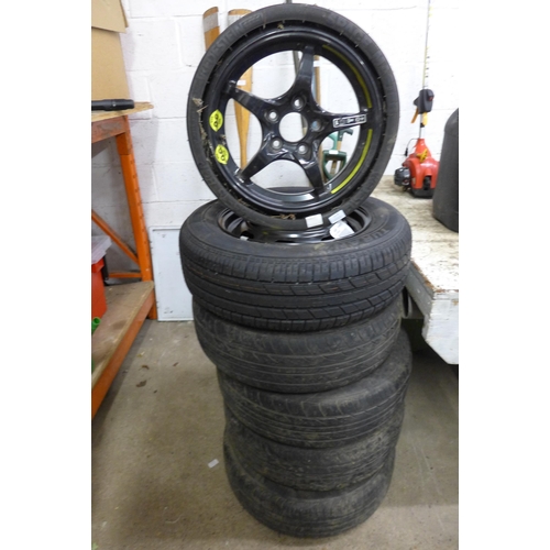 5176 - A set of 4 alloy wheels and tyres, a steel rim and tyre and an alloy spacesaver