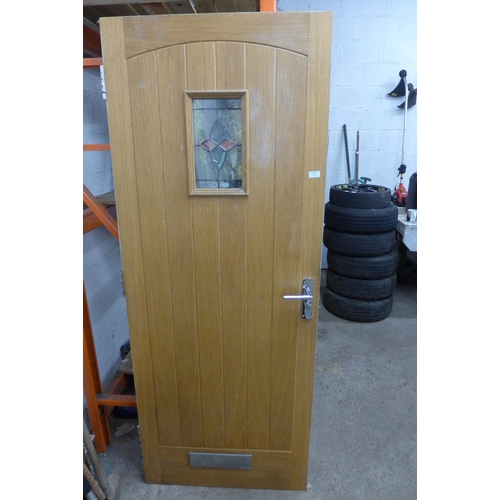 5187 - An part glazed oak external door