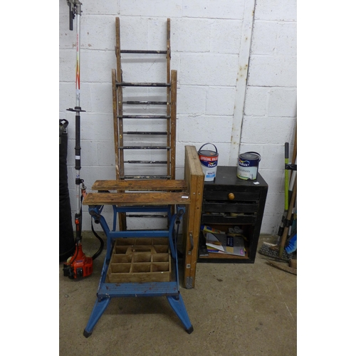 5189 - A set of wooden step ladders, a pasting table, a storage box of tools and a folding work bench