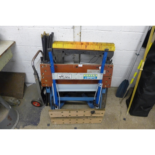 5195 - A Black and Decker Workmate and one other, a quantity of plastic drain rods and a sack trolley