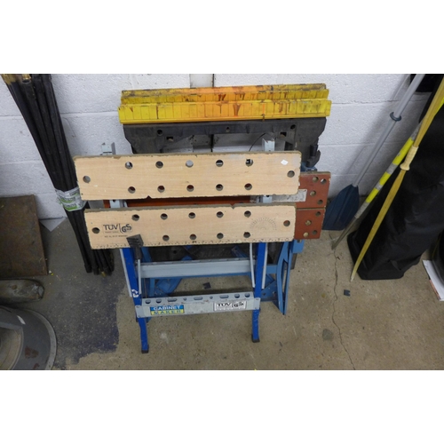 5195 - A Black and Decker Workmate and one other, a quantity of plastic drain rods and a sack trolley