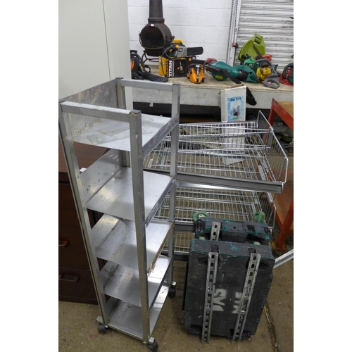 5198 - A quantity of steel shelving and two dollies