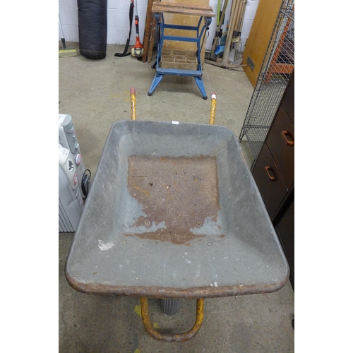 5209 - A large metal wheelbarrow