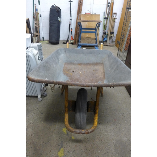 5209 - A large metal wheelbarrow